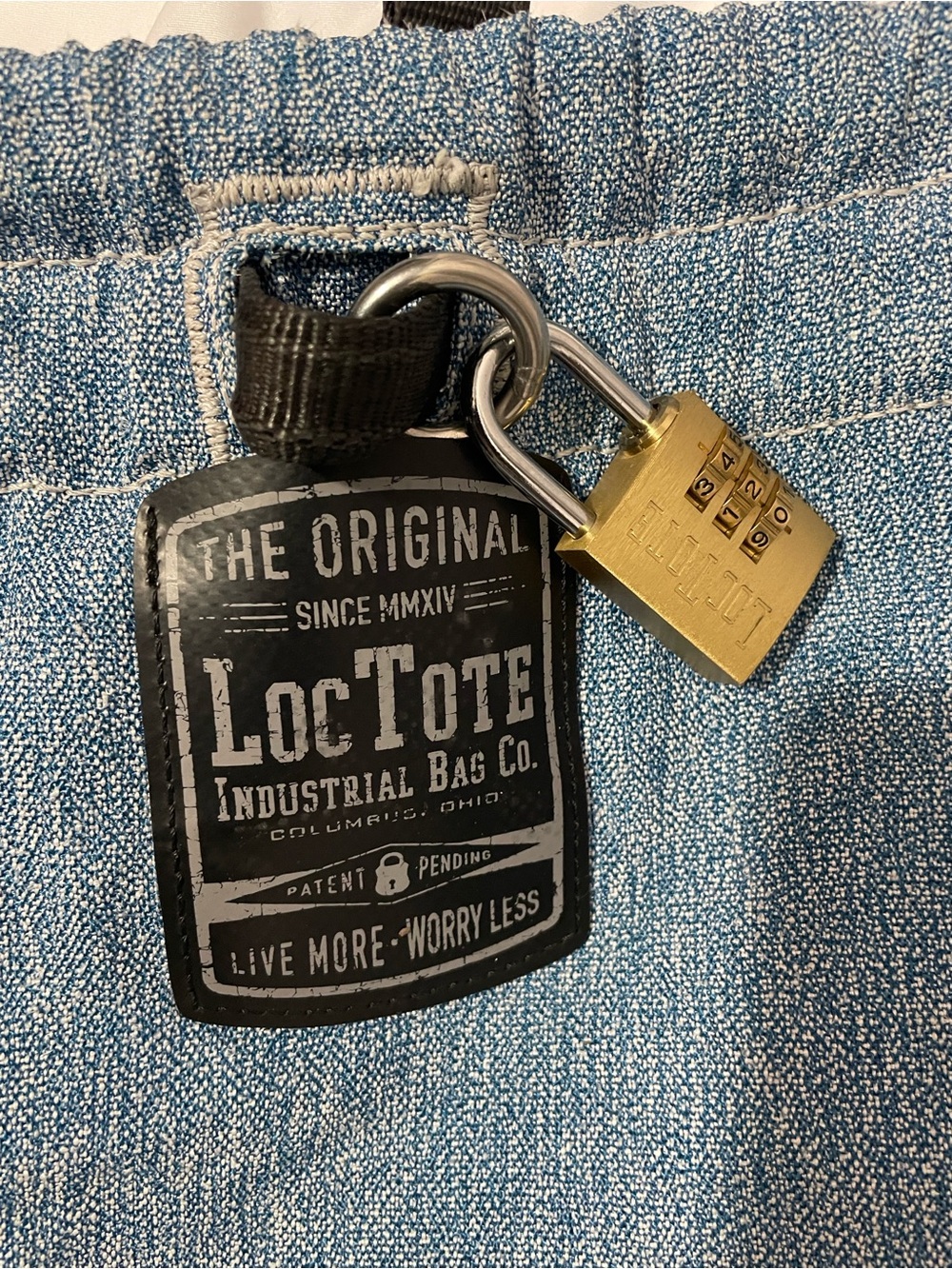 Lesportsac Blue Denim Tote with Black Logo Patch and Gold Lock Accent